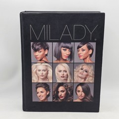 Milady Standard Cosmetology (Milady’s Standard Cosmetology) – Hardcover – GOOD